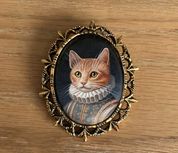 regal cat amulet art