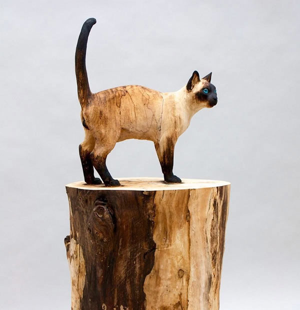 wood siamese on stump art