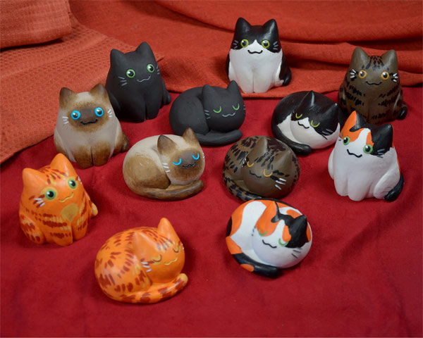 tiny cat sculptures